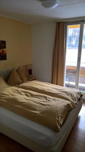 Letto o letti in una camera di Jungfrau Hotel