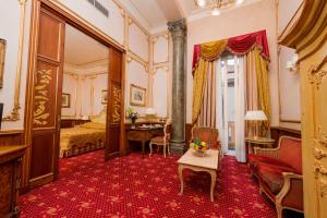 Voodi või voodid majutusasutuse Grand Hotel Wagner toas