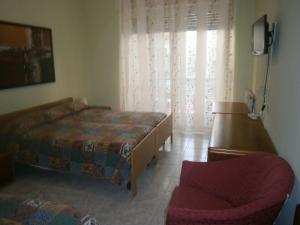 Кровать или кровати в номере Hotel Milanesina