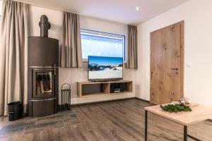 Kuchyň nebo kuchyňský kout v ubytování Appartements Ausblick