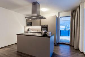 Kuchyň nebo kuchyňský kout v ubytování Appartements Ausblick
