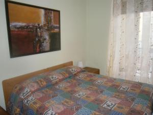 Кровать или кровати в номере Hotel Milanesina