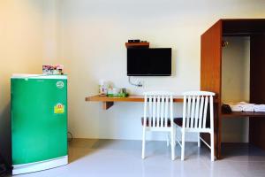 TV a/nebo společenská místnost v ubytování Green Apple Villa