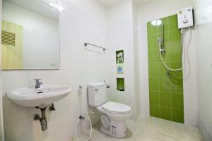 Koupelna v ubytování Green Apple Villa