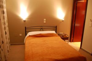 Voodi või voodid majutusasutuse Hotel Antirriο toas