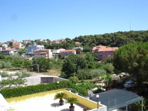 a view of a city with buildings and trees at Brko Apartment in Medulin