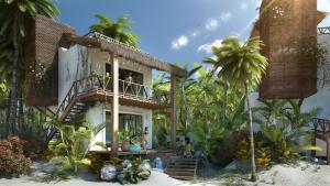 a house on the beach with palm trees at Azucar Hotel Tulum in Tulum