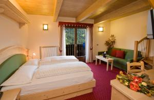 Postel nebo postele na pokoji v ubytování Hotel Miravalle