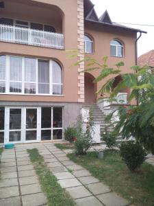 a house with a walkway in front of it at Private House in Berehove