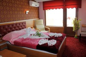 Postel nebo postele na pokoji v ubytování Hopa Heyamo Hotel
