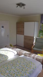Postel nebo postele na pokoji v ubytování Ferienwohnung Haus Gomig