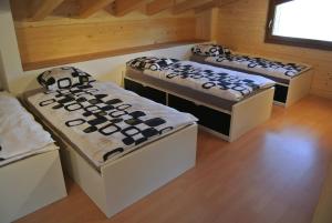 Postel nebo postele na pokoji v ubytování La Tzoum'hostel