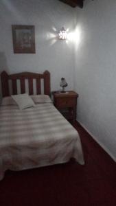 Posteľ alebo postele v izbe v ubytovaní El Peñón