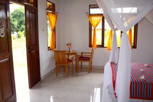 Ένα ή περισσότερα κρεβάτια σε δωμάτιο στο Bali Oase Resort +22 φωτογραφίες