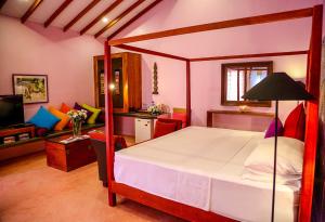 Voodi või voodid majutusasutuse Dickman Resort "The Boutique Hotel" toas