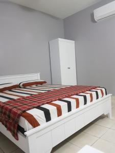 Krevet ili kreveti u jedinici u objektu Homesweet Homestay Jasin