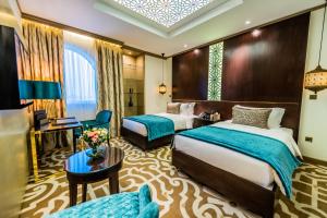 Katil atau katil-katil dalam bilik di TIME Rako Hotel