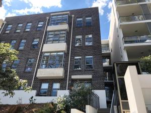 an image of an apartment building at Exquisite Family Home +Parking, Close to CBD in Sydney