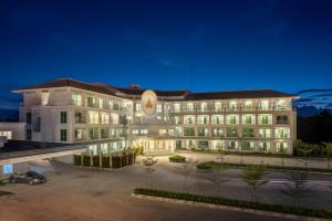 a rendering of a building at night at Chada@Nakhon in Nakhon Si Thammarat