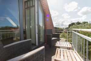Ein Balkon oder eine Terrasse in der Unterkunft Living-art