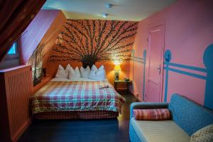 Llit o llits en una habitació de Dépendance Maison Géron