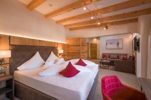 Voodi või voodid majutusasutuse Alpen Glück Hotel Kirchberger Hof toas
