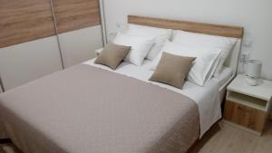 Postel nebo postele na pokoji v ubytování Apartment Sunce