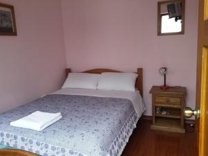 Letto o letti in una camera di Travellers Inn