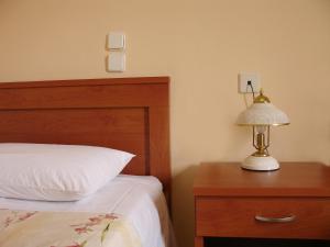 Posteľ alebo postele v izbe v ubytovaní Hotel Kronio
