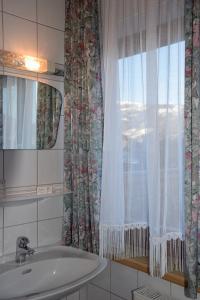 Kúpeľňa v ubytovaní Hotel Pension Schwaiger