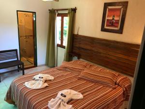 Postel nebo postele na pokoji v ubytování Hotel Complejo Najul Suites-Solo Adultos