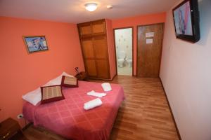 Кровать или кровати в номере Hostería Ailen