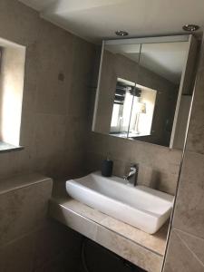 Ein Badezimmer in der Unterkunft Ilmhaus 2