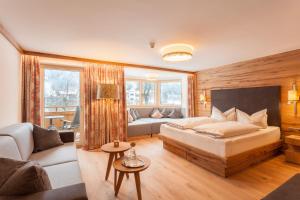 Postel nebo postele na pokoji v ubytování Ferienhotel Sonnenhof