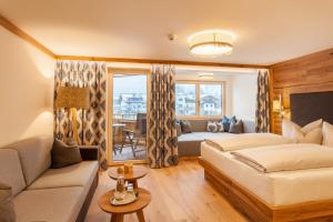 Postel nebo postele na pokoji v ubytování Ferienhotel Sonnenhof