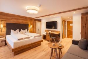 Postel nebo postele na pokoji v ubytování Ferienhotel Sonnenhof