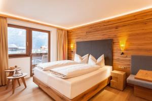 Postel nebo postele na pokoji v ubytování Ferienhotel Sonnenhof
