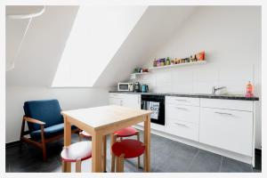 Kuhinja ili čajna kuhinja u objektu Bed & Kitchen am Tavelweg - Adults Only