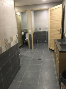 Koupelna v ubytování Hotel le Sherpa