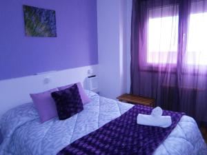 Postel nebo postele na pokoji v ubytování Hostal Don Pepe