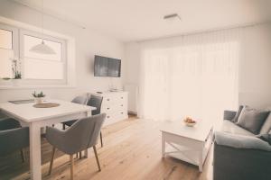 Telewizja i/lub zestaw kina domowego w obiekcie Appartements Freiraum