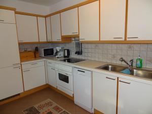 Kuchyň nebo kuchyňský kout v ubytování Apartment Moosberg