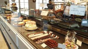 a bakery display case with many different types of food at Villa in Seenahe Badesee Ehmetsklinge in Zaberfeld