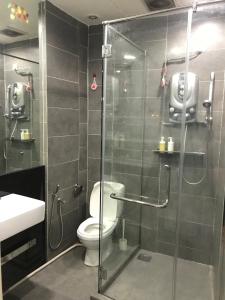 A bathroom at Empire Damansara Residence Suites