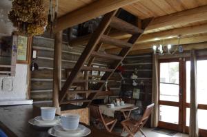 a dining room with a table and a wooden wall at Maravillosa in La Pedrera +30 photos