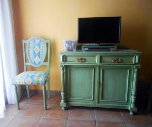 A television and/or entertainment centre at Polytropon Apartments