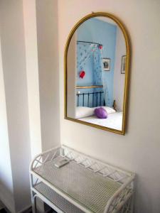 A bed or beds in a room at Polytropon Apartments