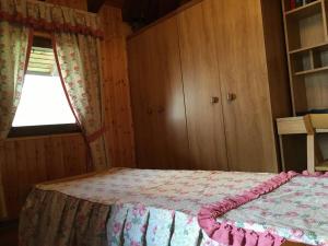 Postel nebo postele na pokoji v ubytování Rascard - Valle di Gressoney