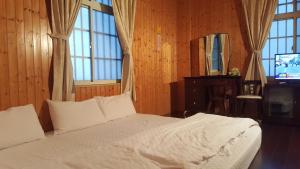 TV a/nebo společenská místnost v ubytování Ming Yang B&B