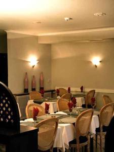 
Ein Restaurant oder anderes Speiselokal in der Unterkunft Hotel il Castello Borghese 
